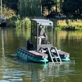 Водный погрузчик для сбора водорослей