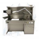 Панинокс /Стол изготовлен из нержавеющей стали. Рабочая поверхность без сварочного шва переходит в раковину. Раковина (ШхДхГ, мм 400х400х250) оборудована смесителем. Раковина может располагаться справа или слева от рабочей перфорированной области. Съемные устойчивые перфорированные пластины рабочей области (3 шт.) Размер перфорированной рабочей области, мм 950х670. В рабочую поверхность встроен формалиновый слив со съемным ситом из нержавеющей стали. Слив отработанного формалина производиться во внешний рез