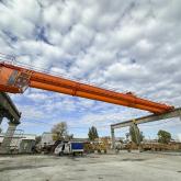 Кран мостовой двухбалочный опорный г/п 10,0т., пролет 32,0м. в комплекте с крановой кабиной и проходной галереей для обслуживания крана