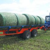 Подборщик рулонов ПР-18 Подборщик рулонов ПР-18 предназначен для погрузки, транспортировки и разгрузки рулонов сена, сенажа, соломы, сформированными пресс-подборщиками. Управление осуществляется одним механизатором, не выходя из кабины. При использовании прицепа необходим один трактор, который не привязывает к себе дополнительной техники и не требует организации работы целого комплекса с/х машин на много дней (отпадает необходимость использования погрузочно- разгрузочной техники в поле и на месте складирова