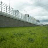 Армогрунтовая подпорная стена. Транспортная развязка в двух уровнях - Суздальский пр. и Выборгское шоссе, Санкт-Петербург