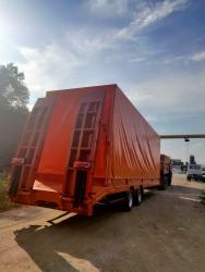 Тентованный прицеп для перевозки спецтехники