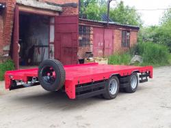Низкорамный прицеп для перевозки спецтехники