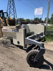 Щебнераспределитель Stanver P 400 для качественного строительства дорожных одежд и точной раскладки песка и щебня.