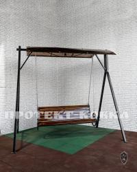 Кованые качели под крышей