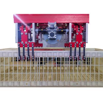 Клещевой захват для пластиковых ящиков